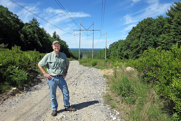 David Wagner stands on a transmission right of way in Thompson, Connecticut showing sprintime foliage. (Photo courtesy of David Wagner)
