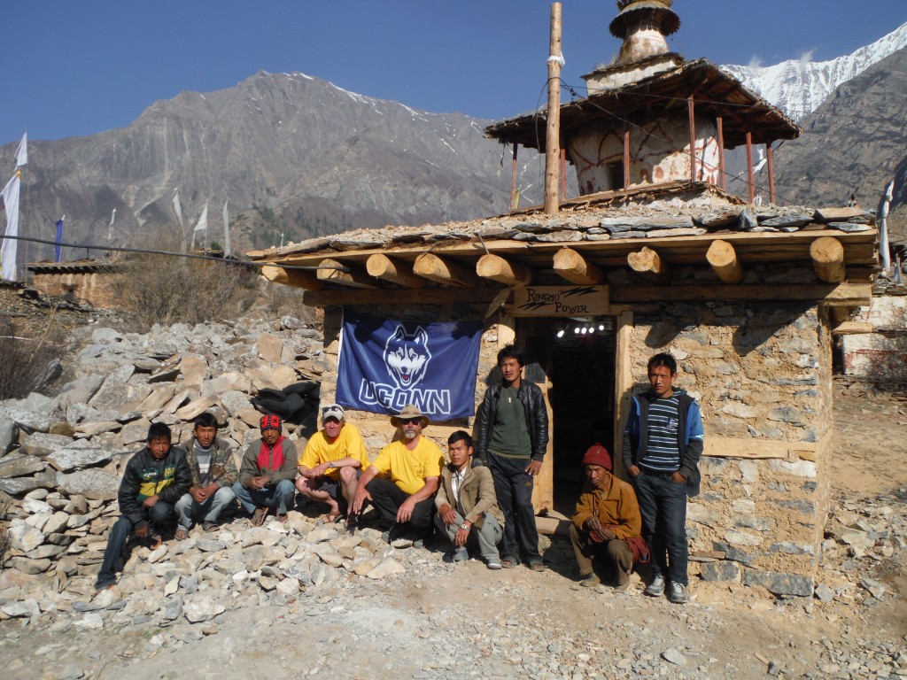 Peter Werth ’80 (CLAS), fourth from left, celebrates in May with friends and local villagers in Ringmo, Nepal, where Himalaya Currents last year installed the village’s first wind turbine, which is now operational and provides power 24 hours a day to this remote community. (Photo courtesy of Peter Werth III '80 (CLAS))