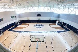The new $35 million, 78,000-square-foot Werth Family UConn Basketball Champions Center includes common areas designed for academic support, sports medicine, and strength training, along with separate practice gyms, locker rooms, coaches’ offices, meeting rooms, and video analysis facilities. (Stephen Slade ’89 (SFA)/UConn Photo)