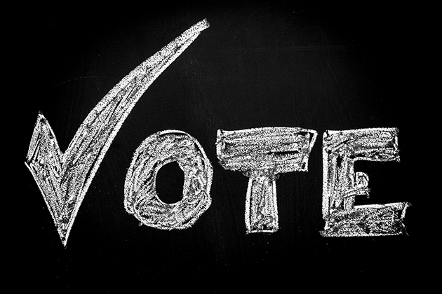 The word Vote, with a check mark for the 'V'. (iStock/UConn photo)