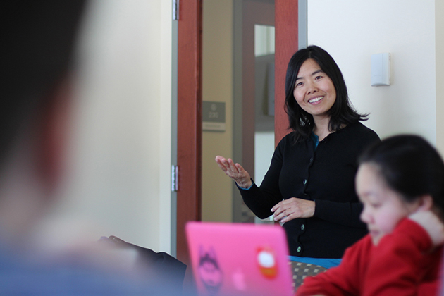 Assistant Professor of Literatures, Cultures, and Languages Liansu Meng leads a discussion in CHIN 3250W, an advanced Chinese writing-intensive course. (Bri Diaz/UConn Photo)