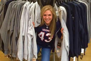 Here's me getting a little lost in the endless selection of UConn apparel at the Co-Op. (Abby Mace/UConn Photo)