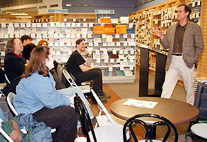 English professor Sam Pickering leads a discussion on Living to Prowl during a book reading at the Co-op in 1998.  PHOTO BY DAVID RUDDY 021898B12