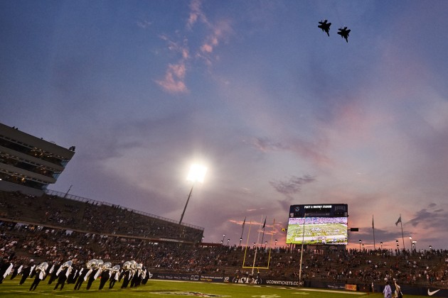 F-15 aircraft fly over Pratt & Whitney Stadium before the game on Sept. 3, 2015. (Peter Morenus/UConn Photo)