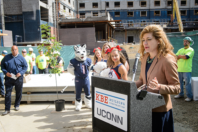President Susan Herbst speaks during the topping off ceremony for the STEM residence hall on Sept. 14, 2015. (Peter Morenus/UConn Photo)