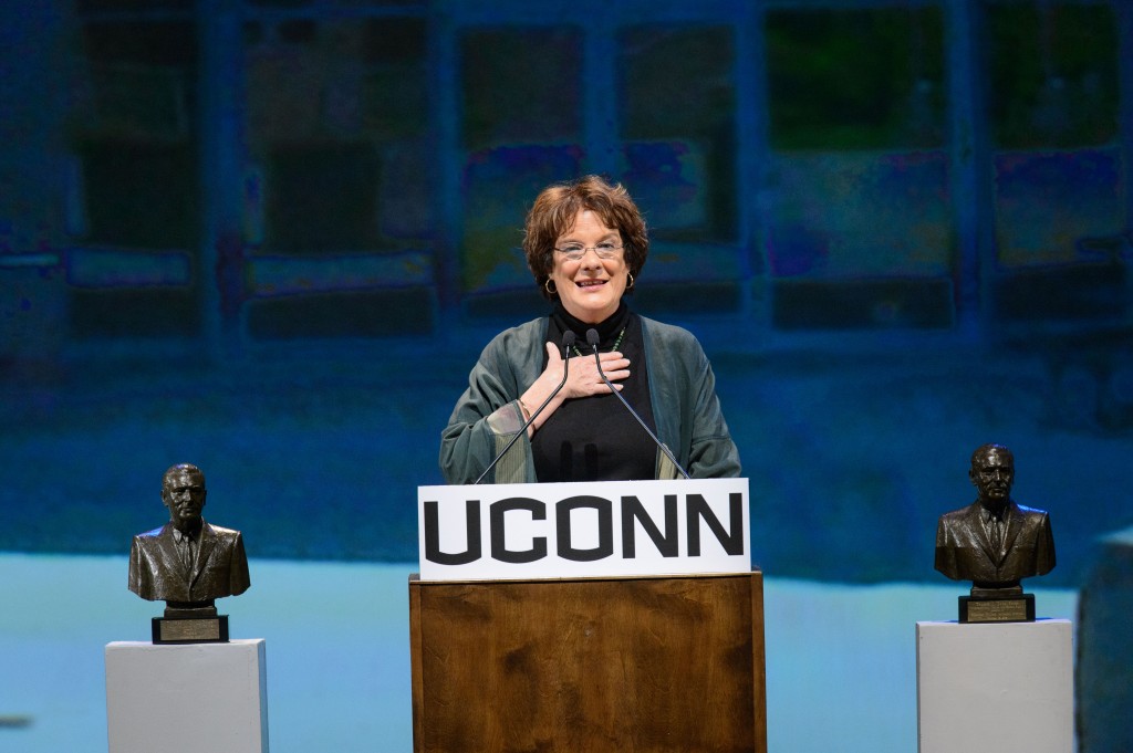 Molly Melching, center, founder and chief executive officer of Tostan, speaks during the ceremony to award the Thomas J. Dodd Prize in International Justice and Human Rights held at the Jorgensen Center for the Performing Arts on Oct. 15, 2015. (Peter Morenus/UConn Photo)