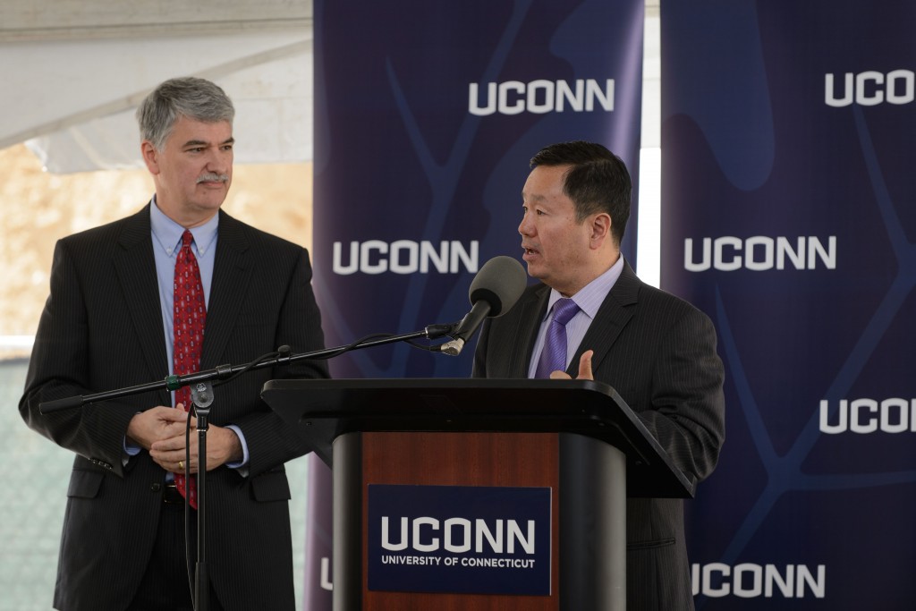 Provost Mun Chois introduces former state senate president pro tempore Don Williams at the groundbreaking ceremony for the Innovation Partnership Building on Oct. 14, 2015. (Peter Morenus/UConn Photo)
