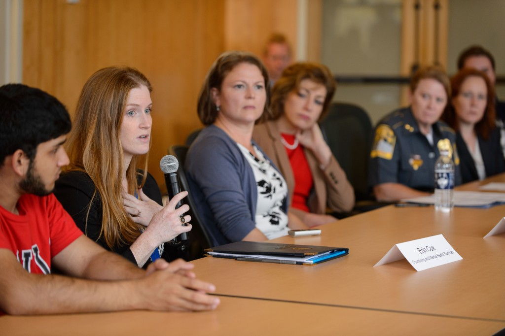 Erin Cox, an outreach coordinator and psychologist at Counseling and Mental Health Services speaks during a discussion on campus safety, emergency training and mental health issues held at the School of Business board room on Oct. 14, 2015. (Peter Morenus/UConn Photo)