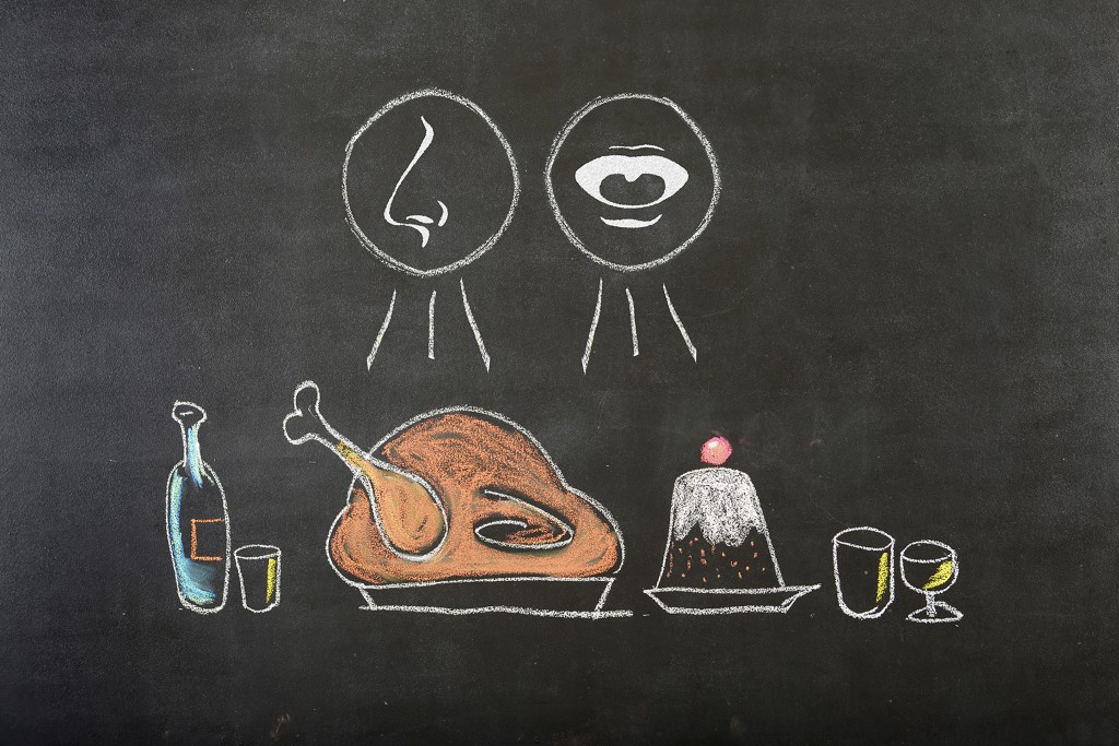 Illustration of a holiday meal with drawings representing taste and smell. (iStock Image)