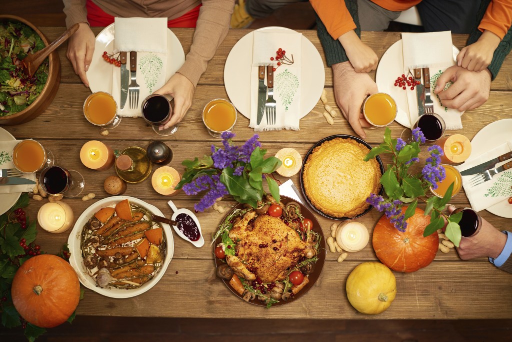 Directly above view of different dishes for celebration of Thanksgiving Day. (iStock Photo)