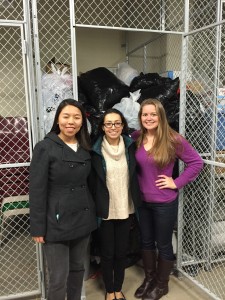From left: Project leaders Karen Xiao, Elise Mester and Christina Klecker delivered enough donations to fill an entire storage cage at the Institute of Living in Hartford, which will distribute the items to patients throughout the winter.  (Photo by Jamie Santaniello) 