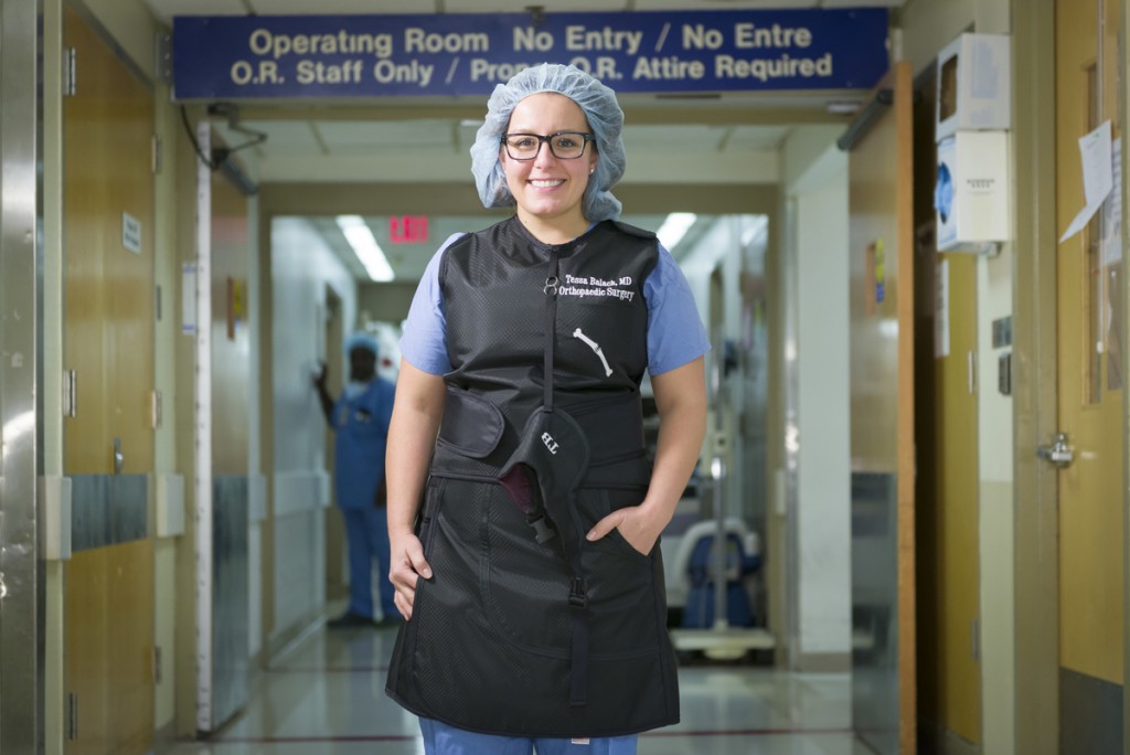 Orthopedic surgeon Tessa Balach stands in front of the OR hallway in the Bliss Building of Hartford Hospital. (Chris Rakoczy/Hartford HealthCare)