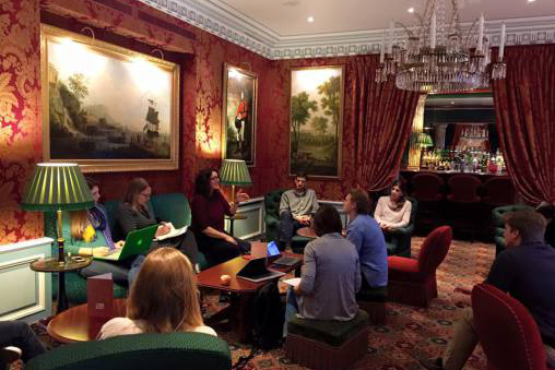 A discussion led by associate professor of geography Anji Seth in the hotel lobby in Paris. (Courtesy of UConn@COP21)