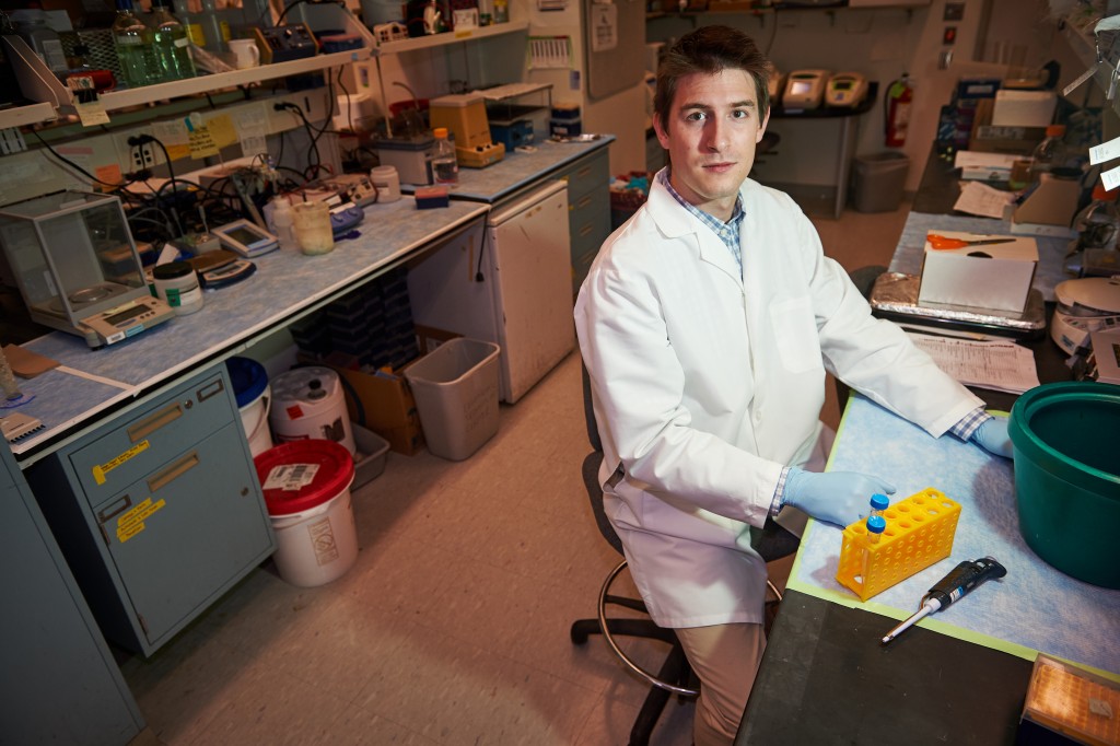 Fourth-year doctoral student Matthew Hanley in a lab at UConn Health in Farmington on Dec. 3, 2015. (Peter Morenus/UConn Photo)