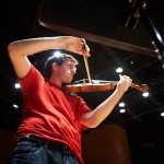 Myles Mocarski '16 (SFA) plays violin during a rehearsal of the University Symphony Orchestra at von der Mehden Recital Hall on Nov. 16, 2015. (Peter Morenus/UConn Photo)