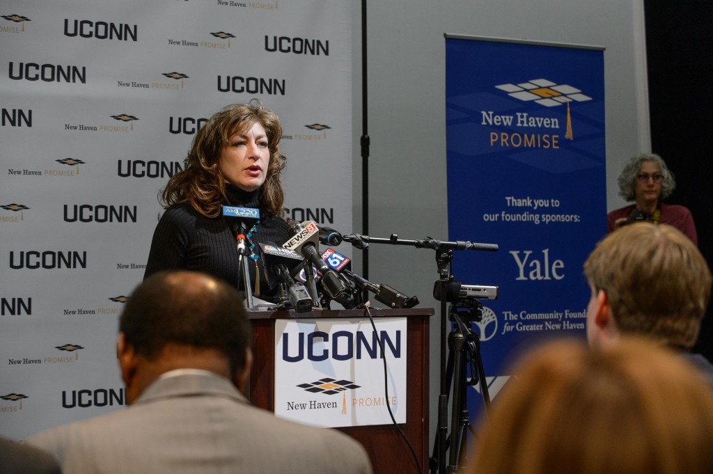 President Susan Herbst speaks during an event to announces an additional financial commitment for New Haven Promise students held at the Cooperative Arts and Humanities High School in New Haven on Dec. 1, 2015. (Peter Morenus/UConn Photo)