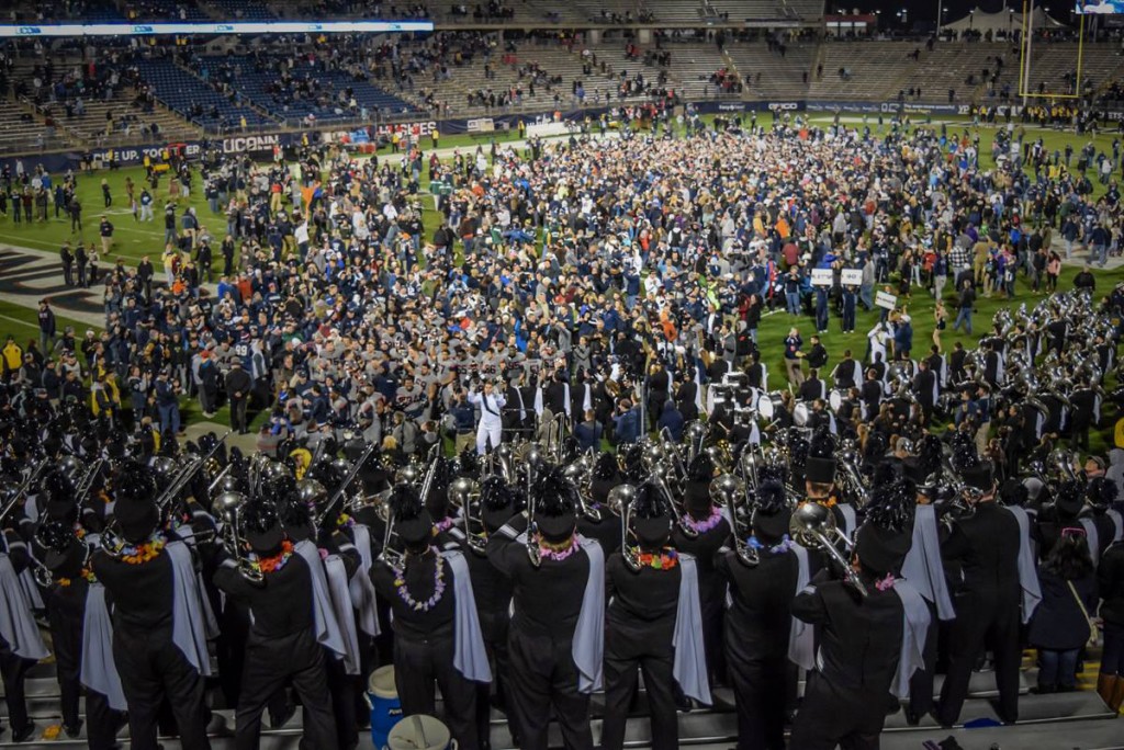 Fans storm the field at Pratt &amp; Whitney Stadium after the Huskies' topped unbeaten AAC rival #13 Houston on Nov. 21, earning bowl eligibility. (Jason Reider '15 (CLAS)/UConn Photo)