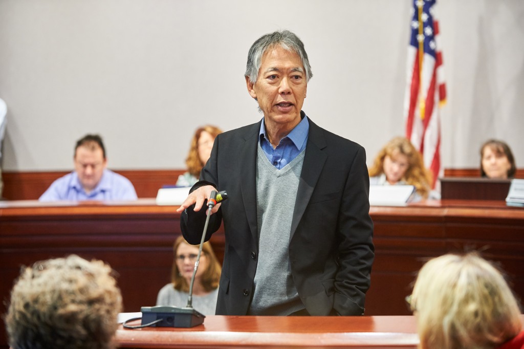 eorge Sugai, professor of educational psychology, speaks during a presentation on hands-off behavioral interventions held at the Legislative Office Building at the state capitol on Jan. 27, 2016. (Peter Morenus/UConn Photo)