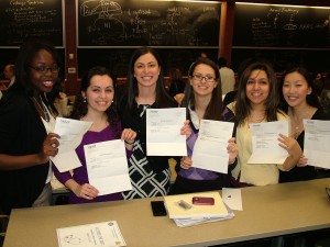 2011: Fourth-year medical students, including Mona Shahriari (second from right), show their residency assignment letters on Match Day. (Photo submitted by Mona Shahriari)