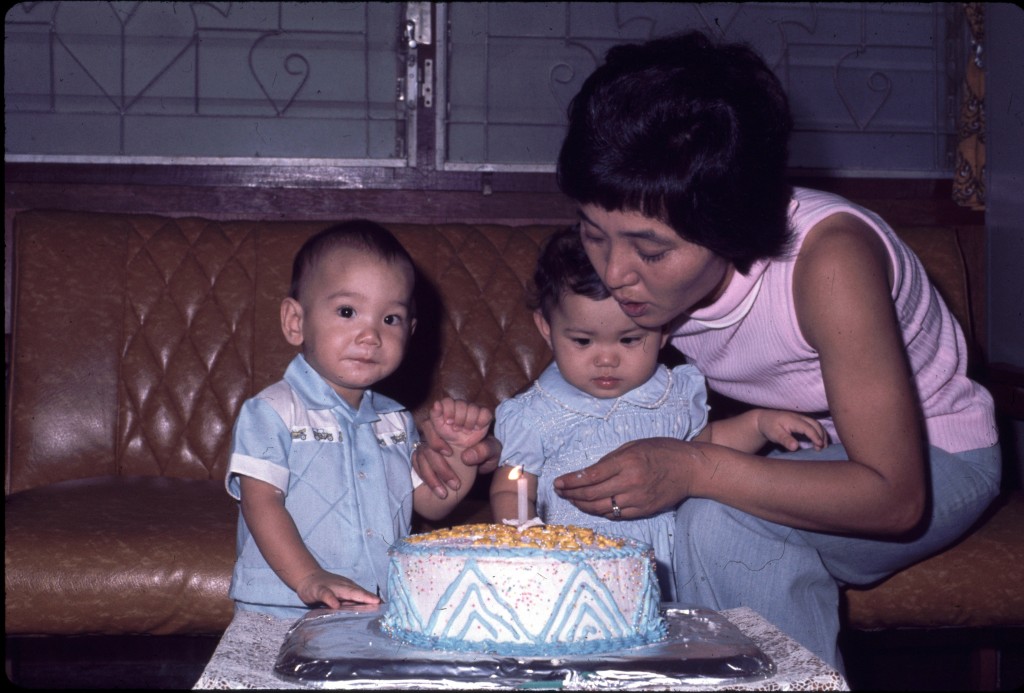 Cathy Schlund-Vials, center, at the age of 1, with her twin brother and her mother, Ginko. (Photo courtesy of Cathy Schlund-Vials)