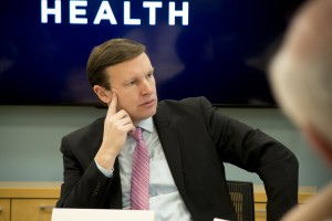 U.S. Sen. Chris  Murphy listens as UConn Health researchers discuss NIH funding.  (Photo by Janine Gelineau)
