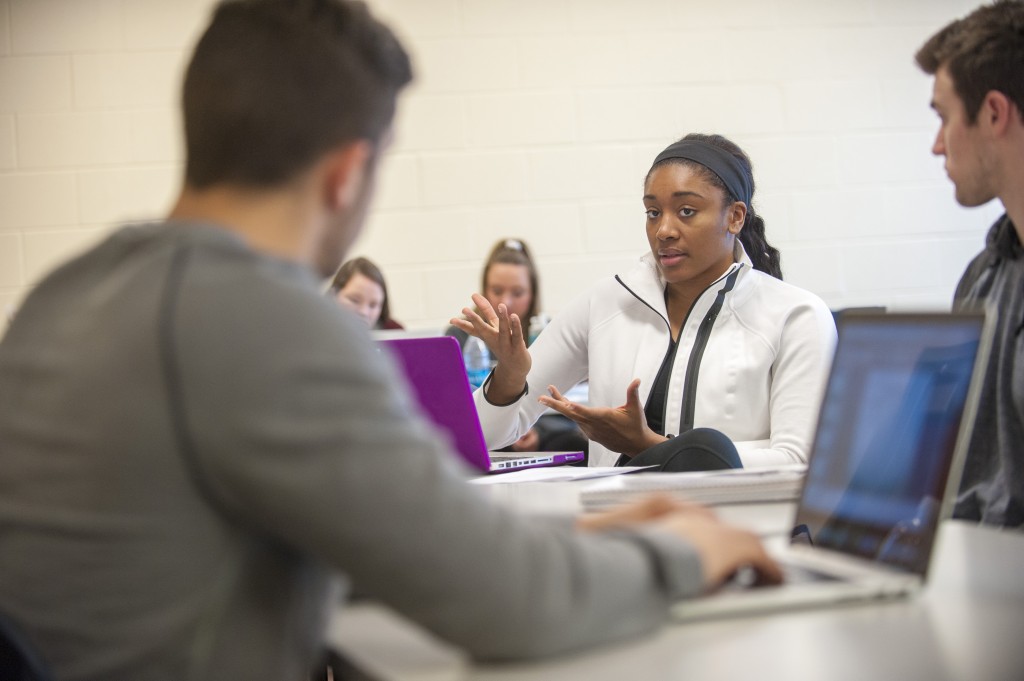 Student-athlete Morgan Tuck in an introduction to sports communication class in Gentry Building on Feb. 17, 2016. (Sean Flynn/UConn Photo)