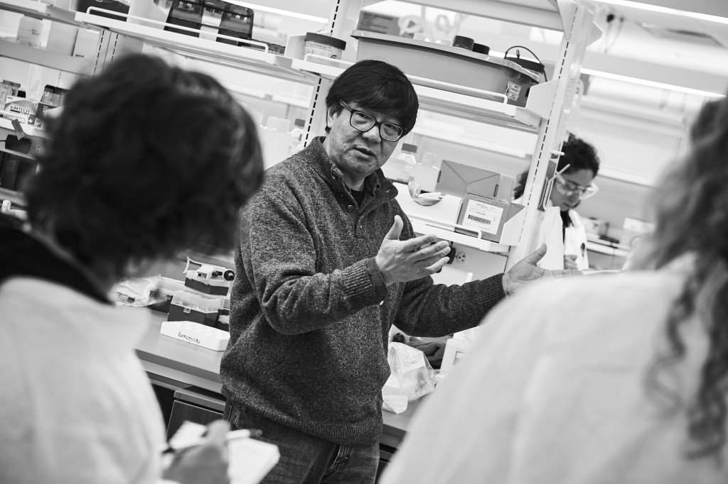 Yijun Ruan, professor and director of genomic sciences, speaks with journalists visiting his lab at The Jackson Laboratory at UConn Health in Farmington on March 15, 2016. (Peter Morenus/UConn Photo)