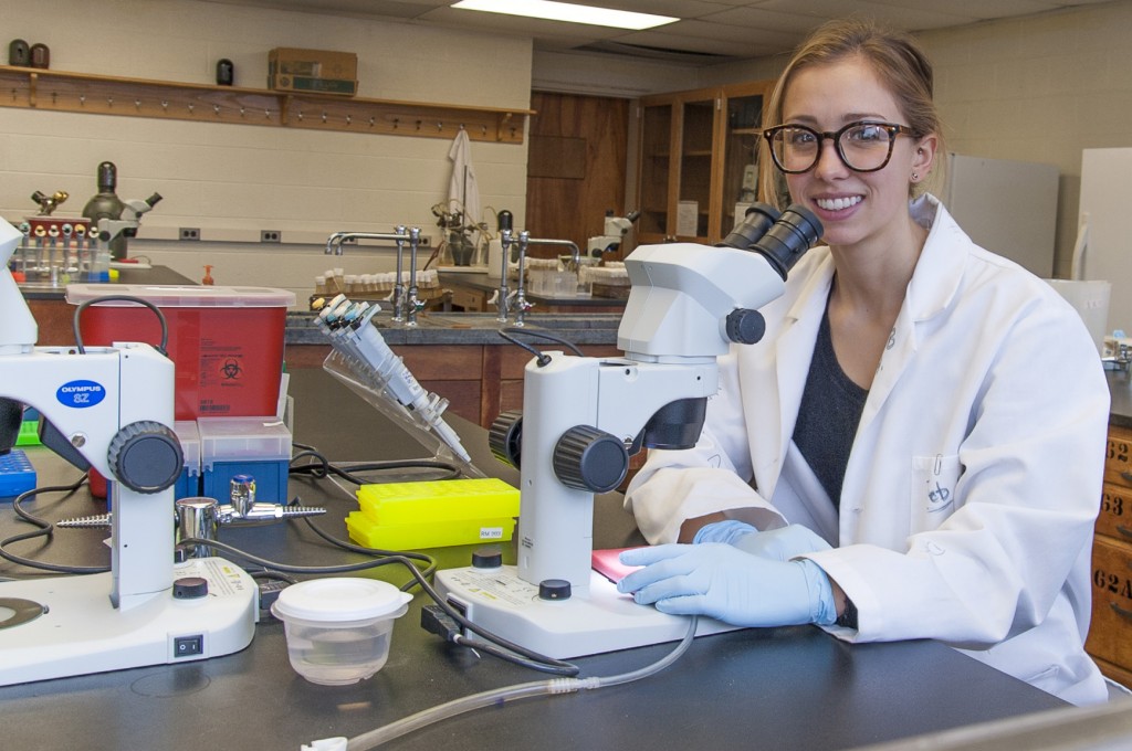 Student-athlete Kennedy Meier in a biology lab on March 23, 2016. (Sean Flynn/UConn Photo)