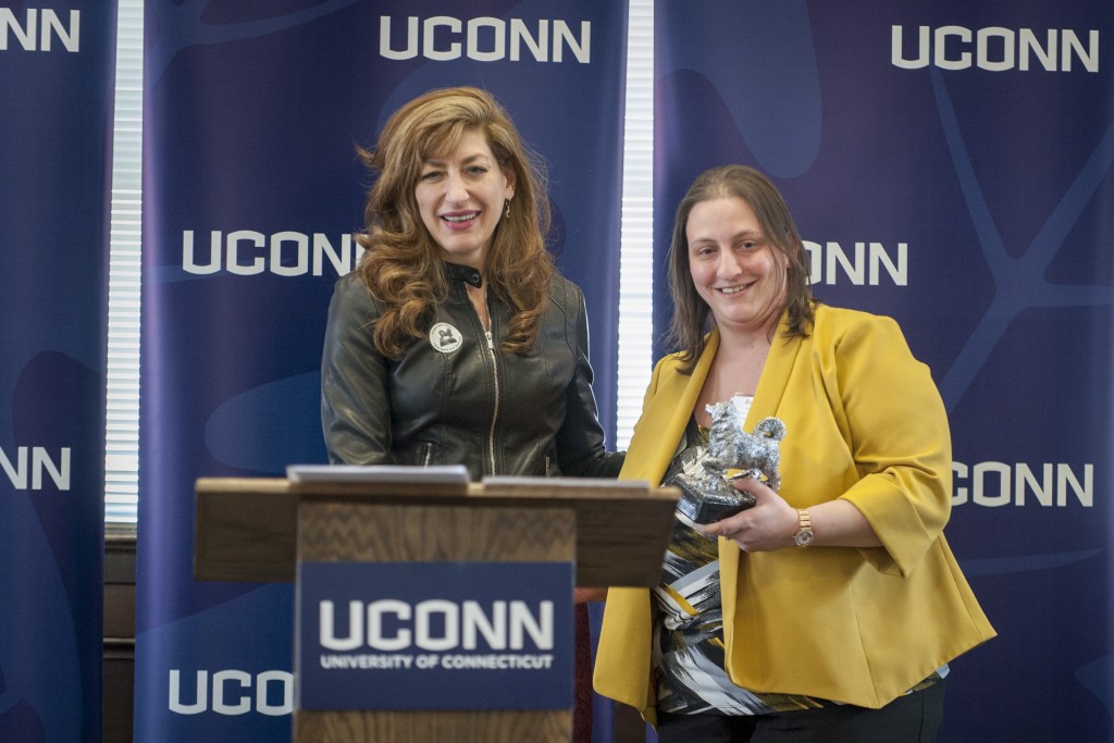 Renee Boggis of Human Resources receives the Unsung Hero Award at the UConn Spirit Awards ceremony on March 8, 2016. (Sean Flynn/UConn Photo)