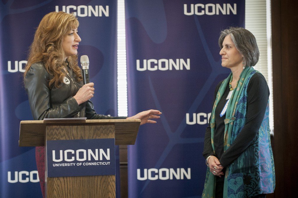 Carol Millette of the Women's Center receives the Outstanding Peer Award at the UConn Spirit Awards ceremony on March 8, 2016. (Sean Flynn/UConn Photo)