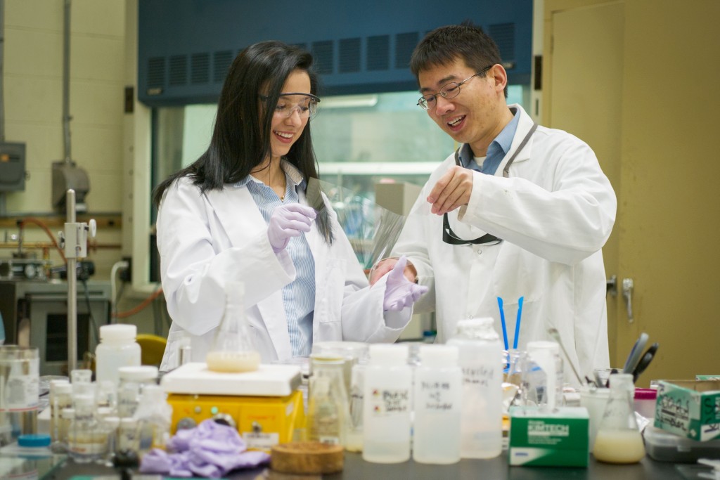 Ornella Tempo '16 (ENG) in the lab at the Institute for Materials Science with Luyi Sun, associate professor of biomolecular engineering, on April 25, 2016. (Peter Morenus/UConn Photo)