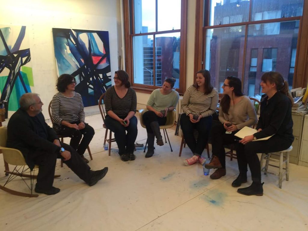 During New York's Armory Arts Week in early March, MFA students in Barry Rosenberg's graduate seminar visited artist studios, including the Brooklyn studio of abstract painter Laura Newman shown here. From left, Barry Rosenberg, Laura Newman, Erin Smith, Jelena Prljevic, Kaleigh Rusgrove, Claire Stankus, and Kelsey Miller. (Photo courtesy of students in ART 5310 Graduate Seminar)