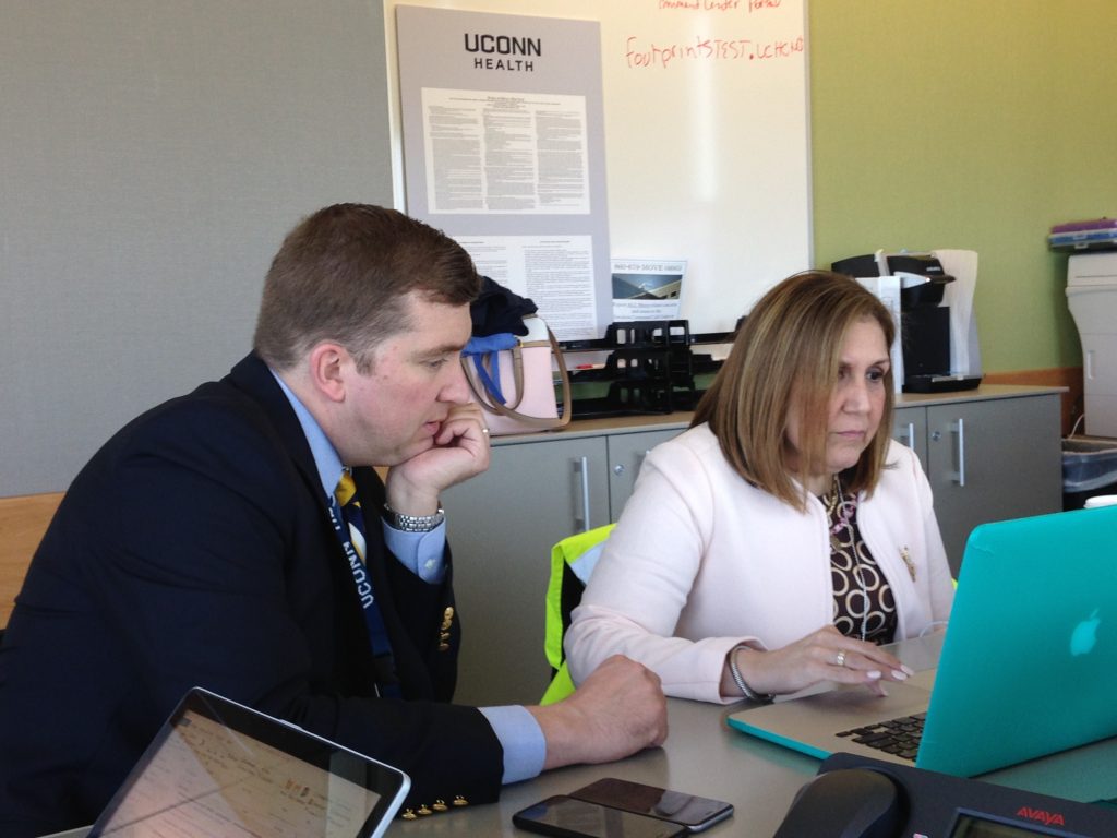 Anne Diamond, CEO of UConn John Dempsey Hospital, right, with Kevin Larsen, associate vice president for business and ancillary services for UConn John Dempsey Hospital, in the Incident Command Center on May 11.