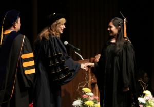 UConn President, Susan Herbst, congratulated each graduating UConn medical, dental, and graduate school student (Photo by John Atashian).