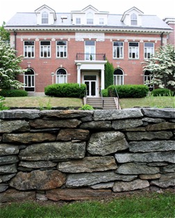 The stone wall surrounding the President's Garden in front of Gulley Hall.