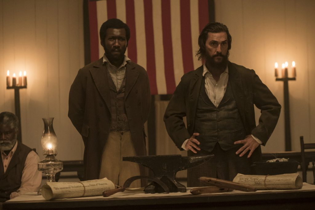 Moses (Mahershala Ali), left, and Newt (Matthew McConaughey) in a scene from 'Free State of Jones,' which is now showing in movie theaters. Sociologist Matthew Hughey describes such films as 'hegemonic.' (Promotional photo from the 'Free State of Jones' official website)