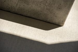 Shadows from a concrete bench outside the ITE building on July 26, 2016. (Sean Flynn/UConn Photo)