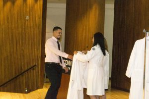 The UConn Dental School held its White Coat Ceremony for the 49 students of the Class of 2020. (Photo by Kristin Wallace) 