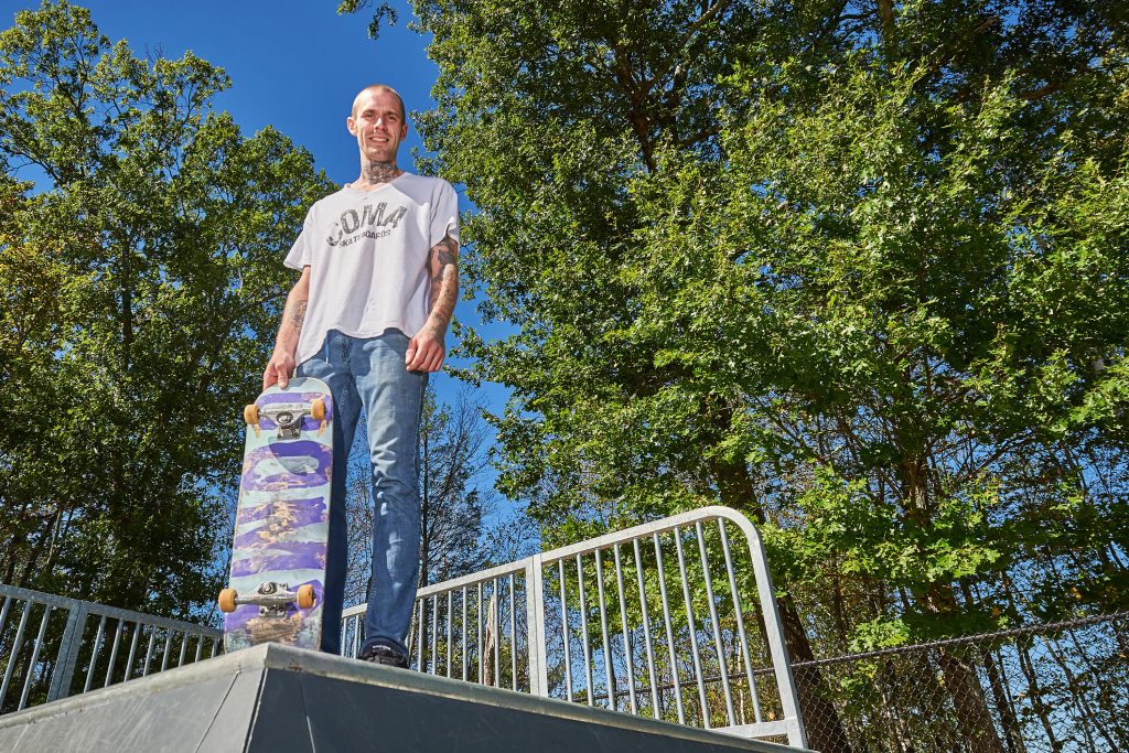 Bent Cordy with one of his Coma skateboards at the Mansfield Skate Park on Sept. 25, 2016. (Peter Morenus/UConn Photo)