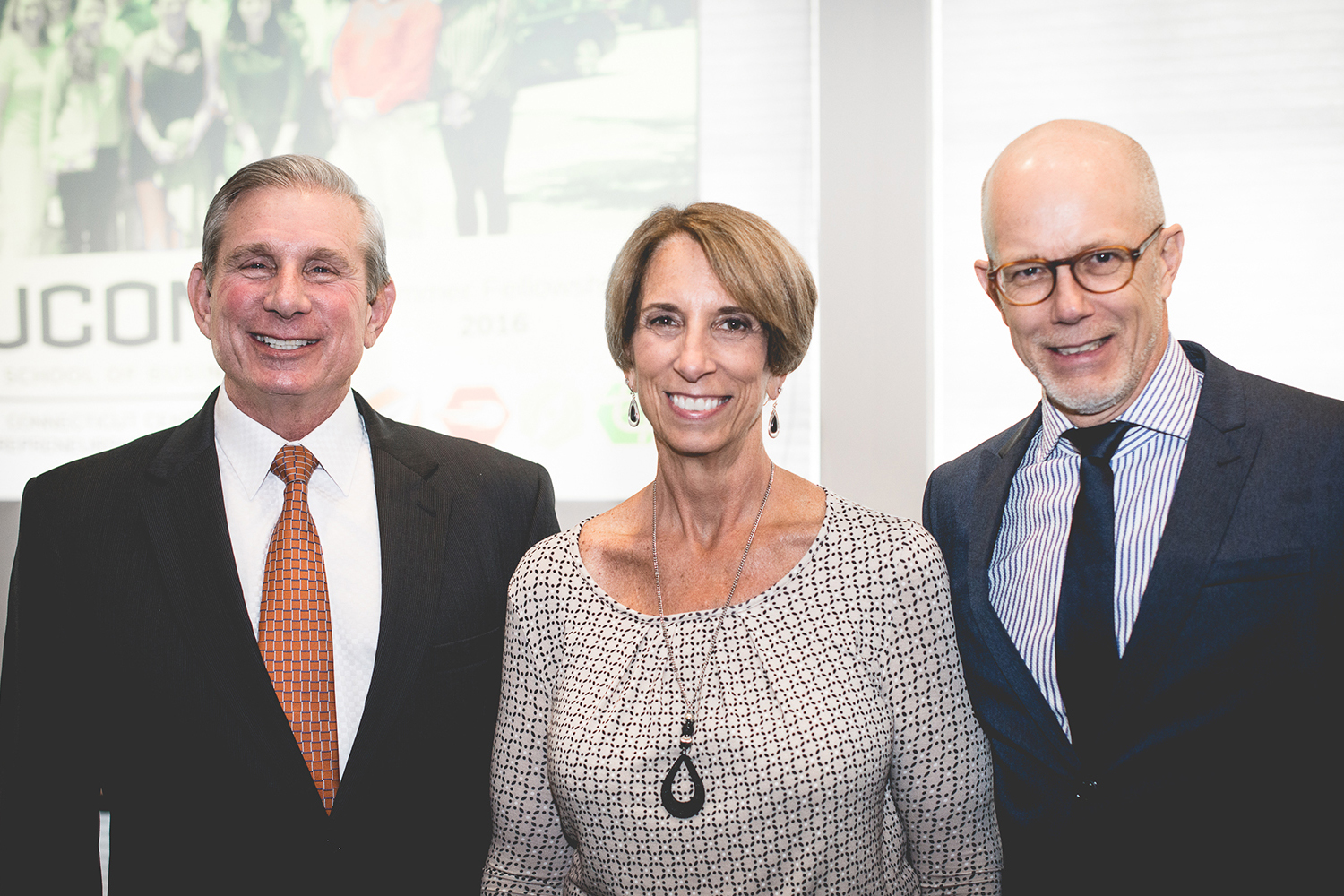 Greg Wolff, Deb (Wolff) Davis, and Professor Timothy B. Folta (Nathan Oldham/UConn photo)