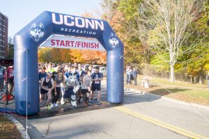 Students, alumni, friends, and family participated in the UConn Huskies Forever 5k on Sunday morning which took participants on a run across campus.  Oct. 16, 2016. (Garrett Spahn/UConn Photo)