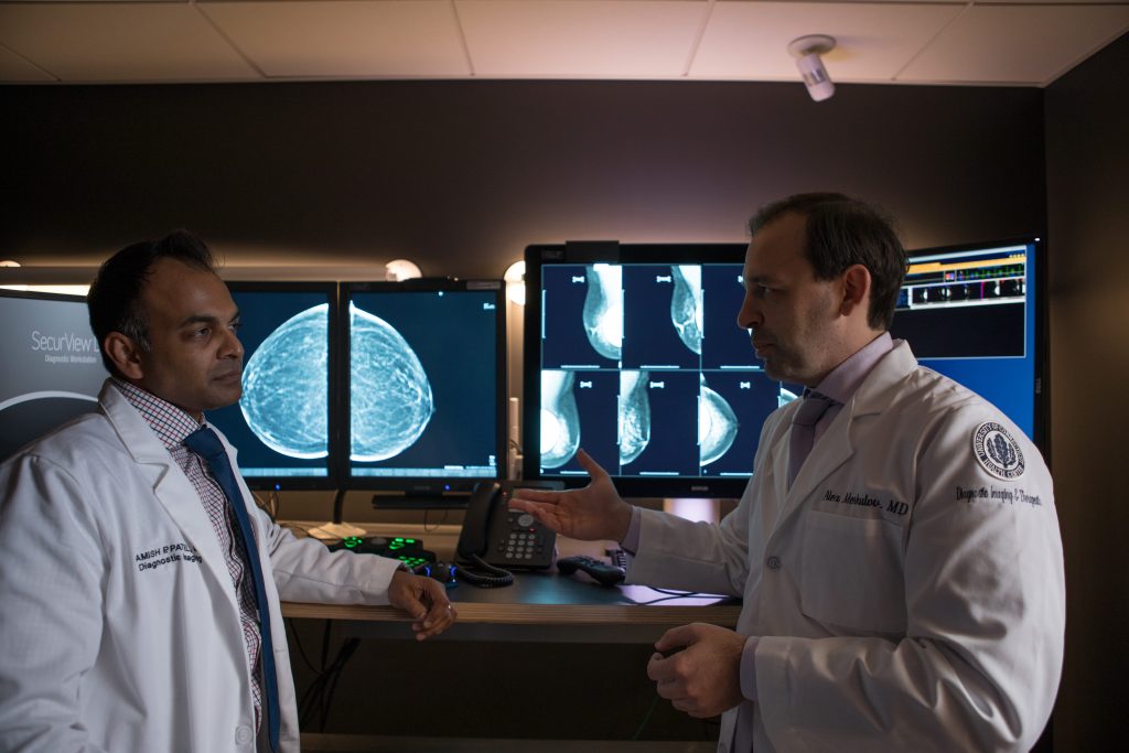 From left, radiologists Dr. Amish Patel and Dr. Alex Merkulov, head of women’s imaging, in the Women's Center Imaging Suite at UConn Health. (Paul Horton for UConn)