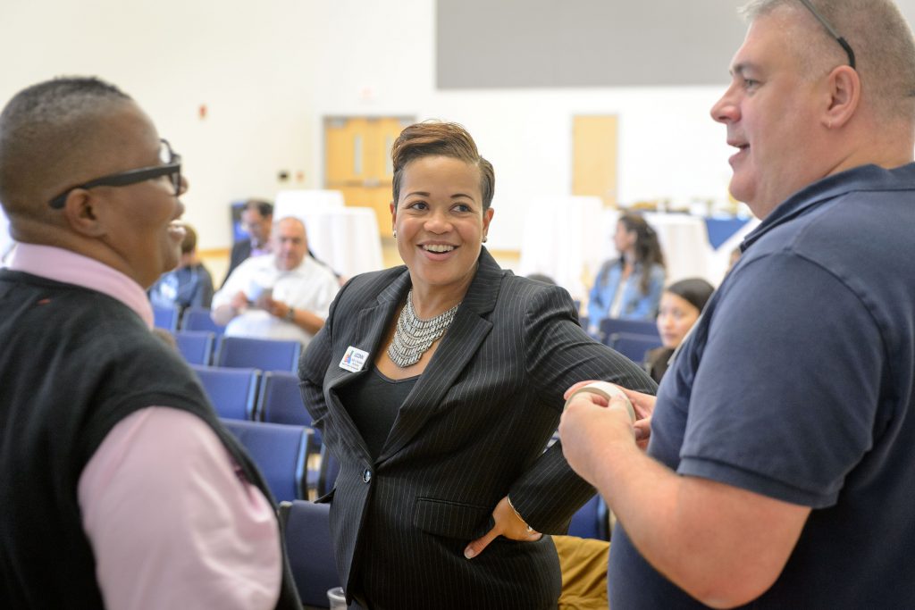 Joelle Murchison speaks, center, speaks with Fleurette King, director, and William Malavé, administrator at the Rainbow Center before a forum on the recent violence seen in Orlando held at the Student Union Ballroom on Oct. 4, 2016. (Peter Morenus/UConn Photo)