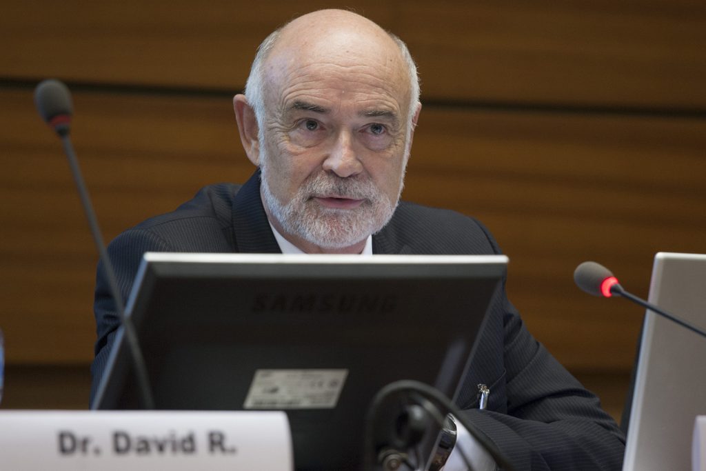 David Benson, professor of molecular and cell biology, at the Biological Weapons Convention Meeting of Experts in Geneva. At the meeting, he and colleagues presented a 'mini-university' on basic science concepts to international diplomats. (Photo by Eric Bridiers)