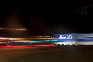 Night photos of the entrance sign to campus in motion on Nov. 10, 2016. (Sean Flynn/UConn Photo)