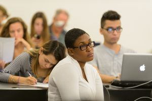 Students listen during a lecture at the Stamford campus on Oct. 19, 2016. (Peter Morenus/UConn Photo)