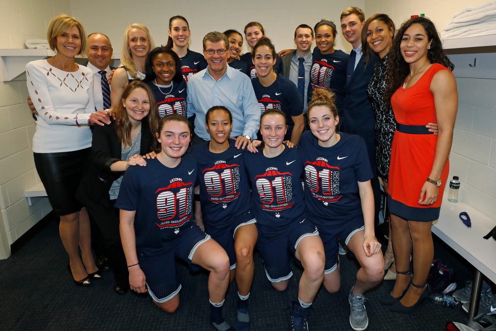 UConn women's basketball celebrate their record-setting 91st win, after defeating SMU at Moody Coliseum in Dallas, Texas on January 14, 2017. (Gregg Ellman for UConn)