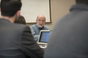 Listening to a lecture by Thomas Morawetz talking with students at UConn School of Law. (Sean Flynn/UConn Photo)