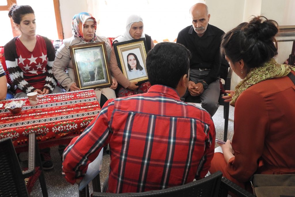 Physicians for Human Rights researcher Christine Mehta (far right) speaks with family members of people killed by Turkish security forces in the country’s southeast. (Physicians for Human Rights Photo)