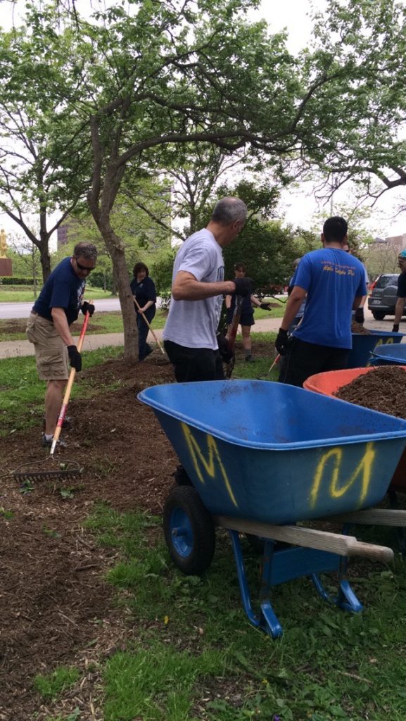 Around the nation, alumni reach for rake, hammer, paintbrush. (UConn Foundation Photo)